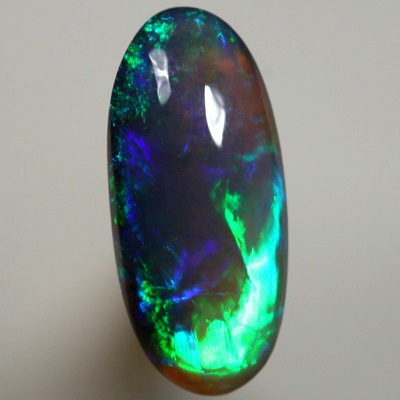 SOLID BLACK CRYSTAL OPAL Very bright turquoise and green over purple